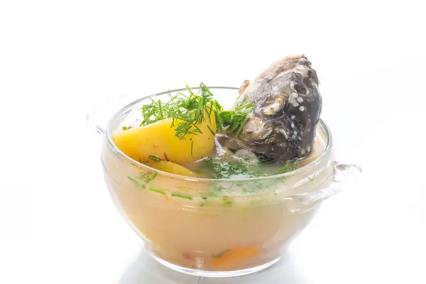Σούπα Λαχανικών Ψάρια Ένα Γυάλινο Μπολ Ένα Ξύλινο Τραπέζι — Φωτογραφία Αρχείου