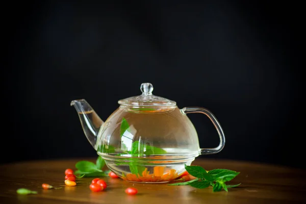 Hot Tea Ripe Red Goji Berries Glass Teapot Isolated Black — Stock Photo, Image