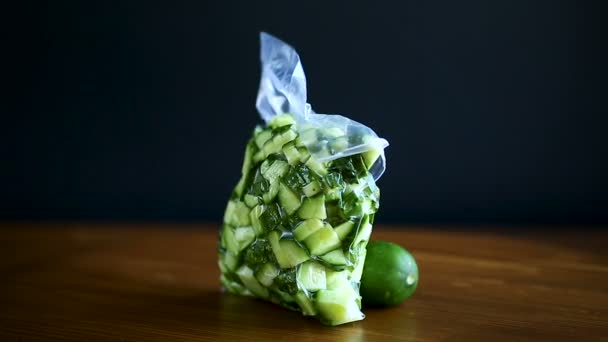 Fresh sliced cucumbers in a vacuum package — Stock Video