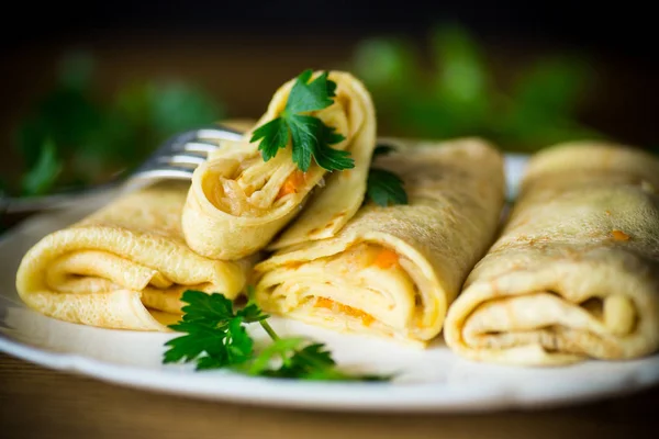 Thin fried pancakes stuffed with stewed cabbage — Stock Photo, Image