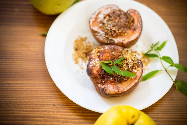 Sweet ripe quince baked with walnuts and honey — Stock Photo, Image