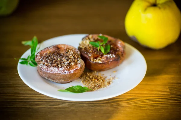 Sweet ripe quince baked with walnuts and honey — Stock Photo, Image