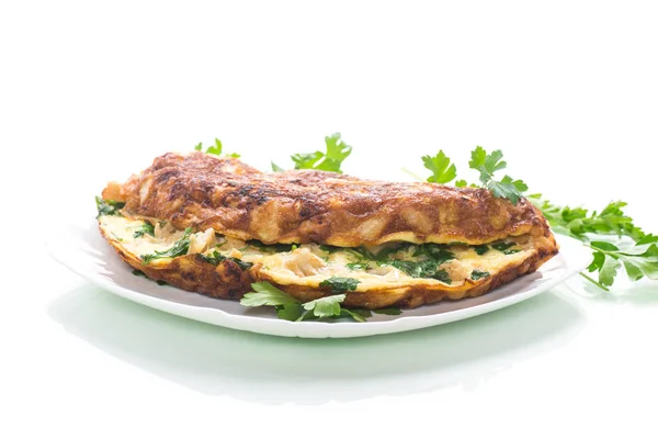 Frittata fritta con cavolfiore e verdi in un piatto — Foto Stock