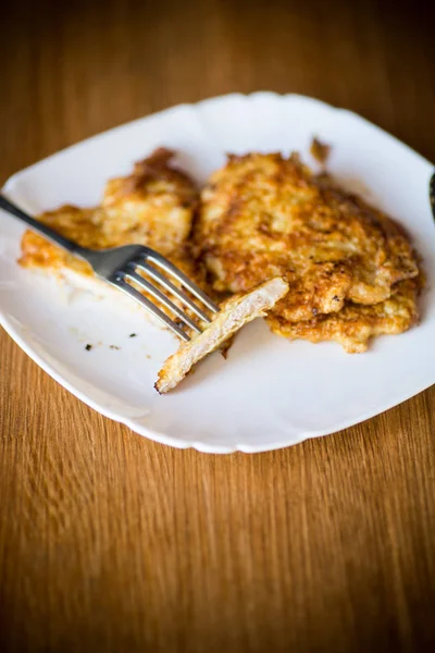 Pork fillet chop fried in batter, in a plate — Stock Photo, Image