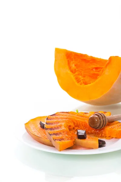 Grilled sweet ripe pumpkin, in a plate with honey — Stock Photo, Image