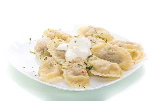 Dumplings boiled with stuffing on a white background — Stock Photo, Image