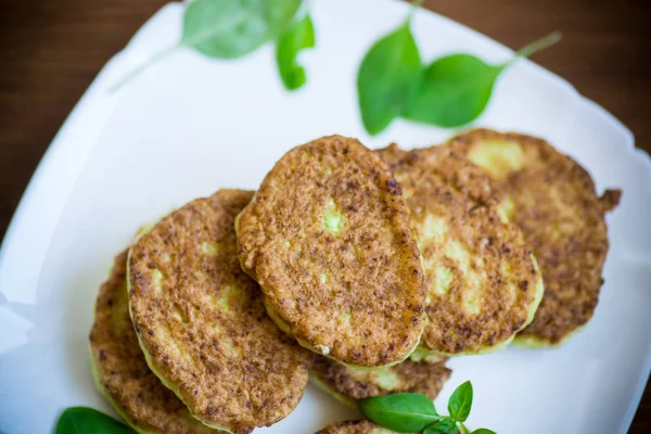 Vegetable fritters made from green zucchini in a plate — Stock Photo, Image