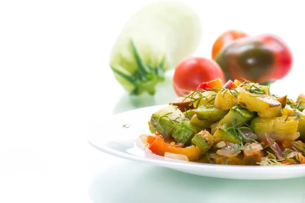 Fried zucchini with red pepper, onions, tomatoes and other vegetables — Stock Photo, Image