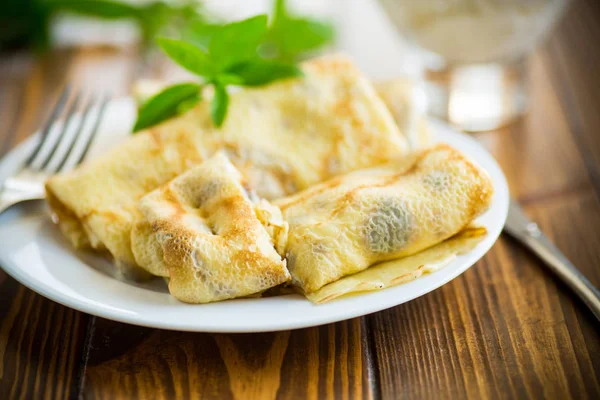 Sweet fried thin pancakes with cottage cheese inside — Stock Photo, Image