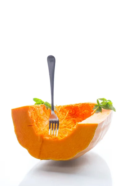 Half ripe organic pumpkin isolated on white — Stock Photo, Image