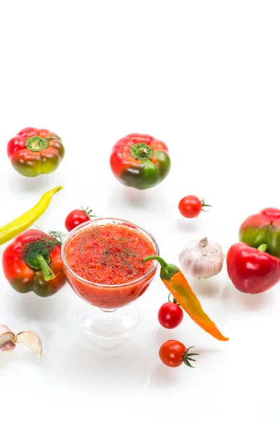 Homemade hot adjika from tomatoes, hot and sweet peppers with spices — Stock Photo, Image