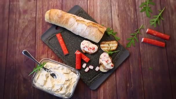 Cheese sandwich and crab sticks on top — Stock Footage Cheese sandwich and crab sticks on top Royalty Free Stock Footage