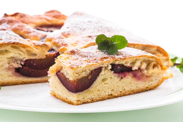 Sweet baked homemade plum cake with icing sugar — Stock Photo, Image