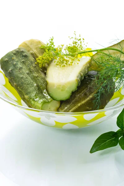 Lightly salted cucumbers with spices in a bowl — Stock Photo, Image