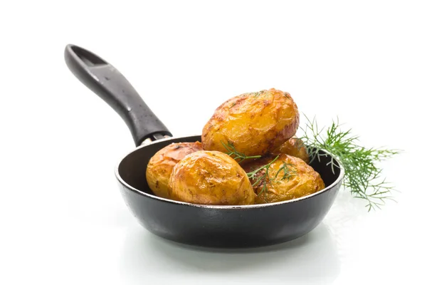 Whole fried young potatoes in a pan — Stock Photo, Image