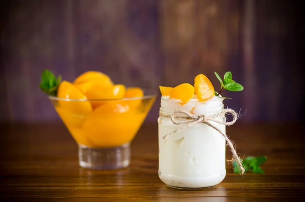 Homemade Sweet Yogurt Slices Pickled Peaches Glass Jar Wooden Table — Stock Photo, Image