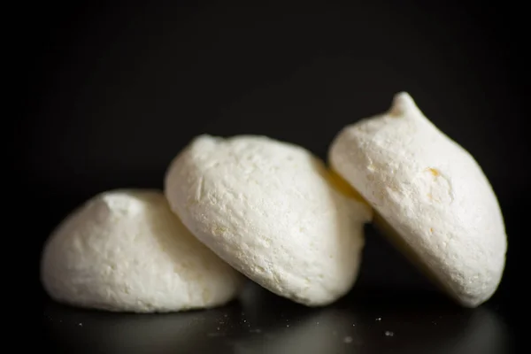 Sweet Tasty White Meringues Burlap Tablecloth Isolated Black Background — Stock Photo, Image