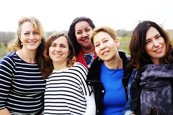 Group of mature beautiful ladies enjoying on a nice day outside