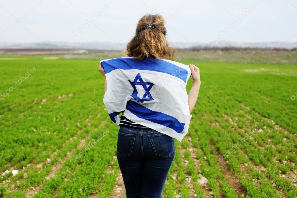 Woman holding an Israeli flag