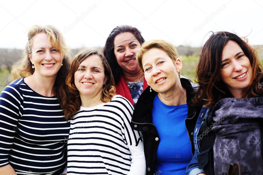 Group of mature beautiful ladies enjoying on a nice day outside