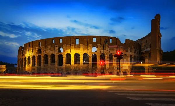 Colosseum and car lights — Stock Photo, Image