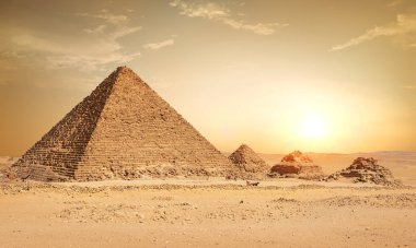Pyramids in sand desert clipart