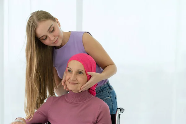 Young Daughter Embracing Her Sick Mom Who Wearing Headscarf Wheelchair — Stock Photo, Image