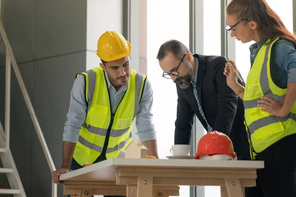 Team Multiethnic Architects Working Construction Plans Meeting Room Engineers Discussing — Stock Photo, Image