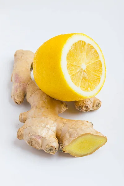 Ginger and lemon on a white background