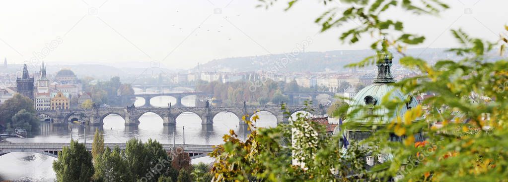 Panoramic morning view of Prague bridges and old town in the morning. Historical and modern, a beautiful city with a rich history, centre of Europe, architecturally unique European town, attractive for tourists. Holiday, europe, history, old town, cu
