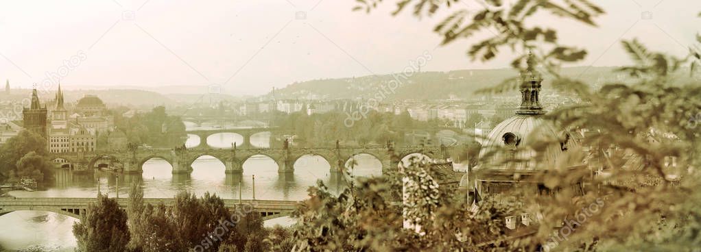 Panoramic morning view of Prague bridges and old town in the morning. Historical and modern, a beautiful city with a rich history, centre of Europe, architecturally unique European town, attractive for tourists.