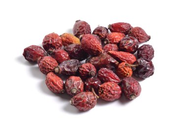 Şifalı otlar hammadde beyaz izole kurumuş. Dogrose veya Rosa canina kalça 