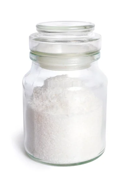 Jar met geraspte kokos geïsoleerd op witte achtergrond — Stockfoto