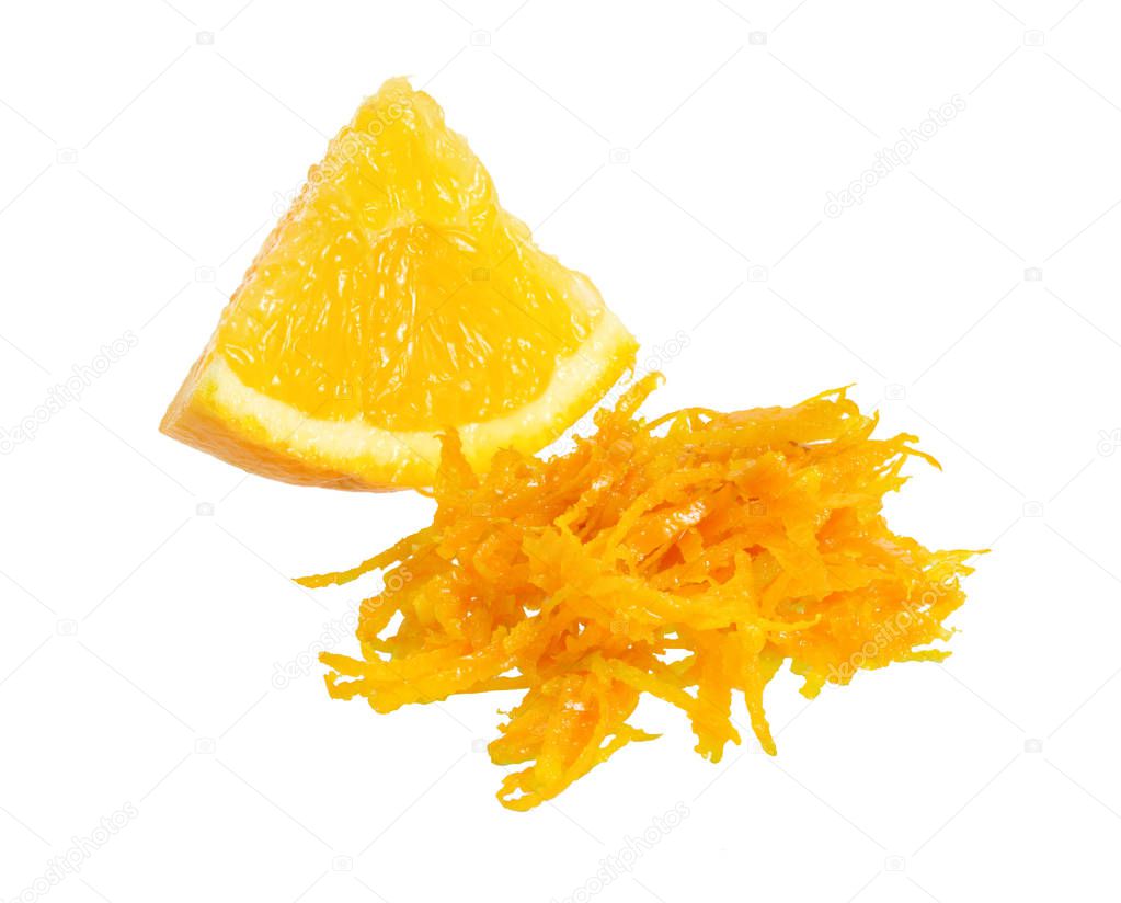Fresh Orange Zest with piece of fruit. Isolated on white background.