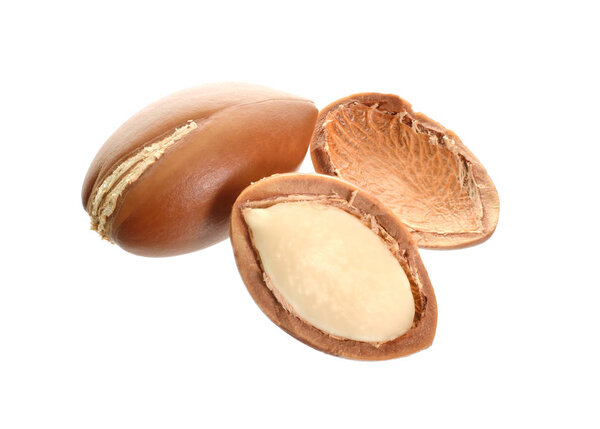 Argan seed oil. Isolated on white background. Full dept of field.