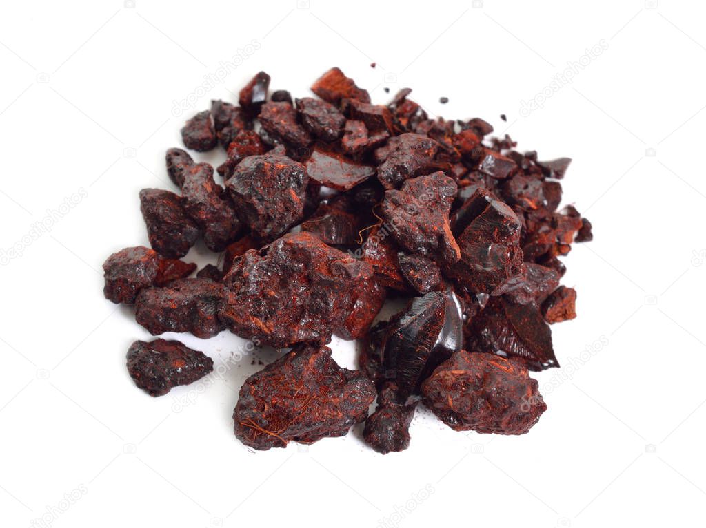 Dragon's blood red resin isolated on white background.
