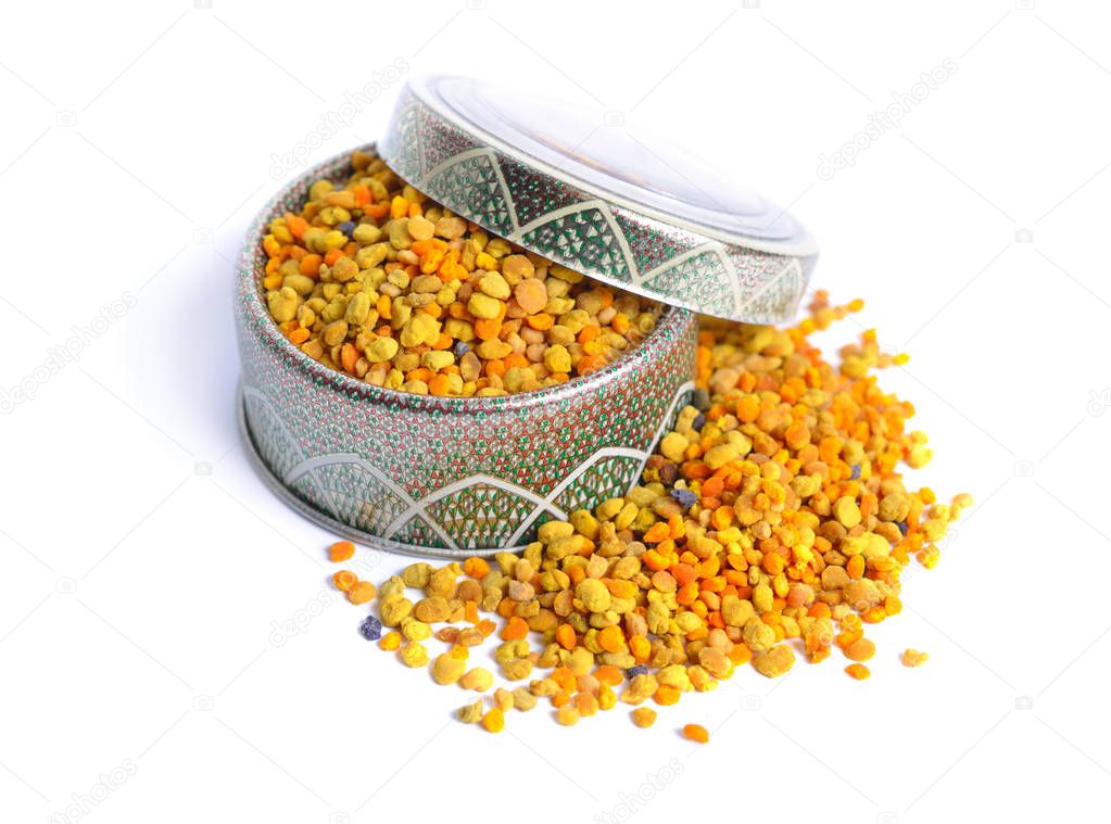 Bee pollen baskets isolated on white background