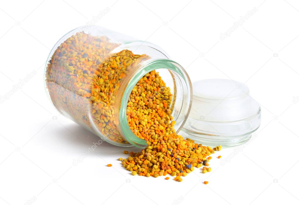 Bee pollen baskets in the glass jar. isolated on white background