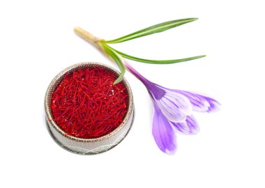 Saffron is a spice derived from the flower of Crocus sativus. Isolated on white background clipart