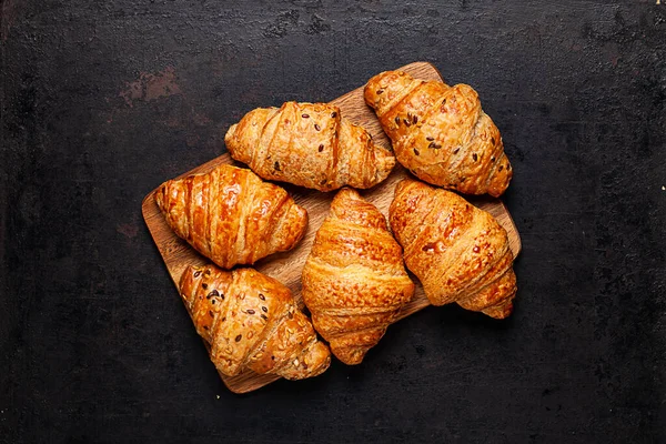 Croissants Wooden Board Lying Old Rustic Background — Stock Photo, Image