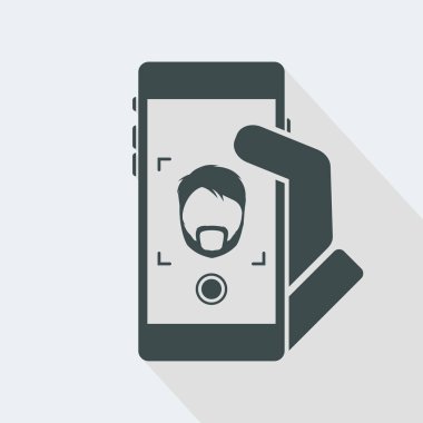 Sakallı adam bir selfie alır