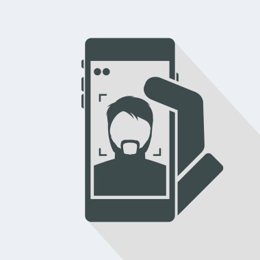 Smartphone bir sakallı çocuğa bir fotoğraf çekmek