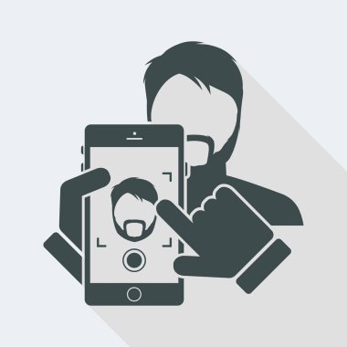 Smartphone bir sakallı çocuğa bir fotoğraf çekmek