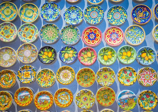 Souvenir from Sicily: fridge magnets with colourful design. Useful for background.