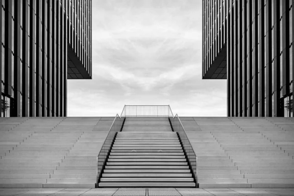 Wide stairway between two modern office buildings at the Medienhafen (media harbour) in Dusseldorf, Germany. Toned.