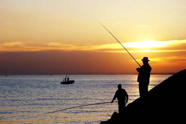 Fisherman Silhouettes Sunset Royalty Free Stock Images