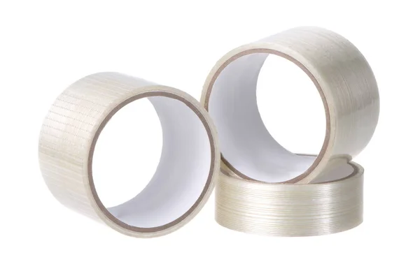 Yapışkan bant, beyaz arka plan ISO yakın çekim üç rulo