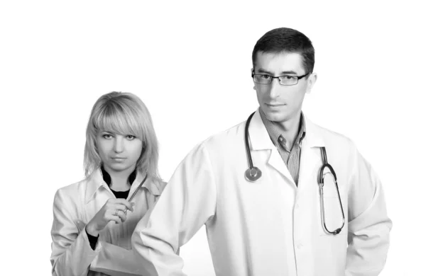 男男女女穿着医生的白衣 带着听诊器 隔离在白色背景上 — 图库照片