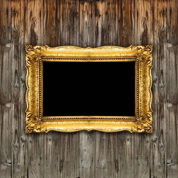 Quadro de imagem de ouro velho no fundo de madeira, preto dentro mockup — Fotografia de Stock