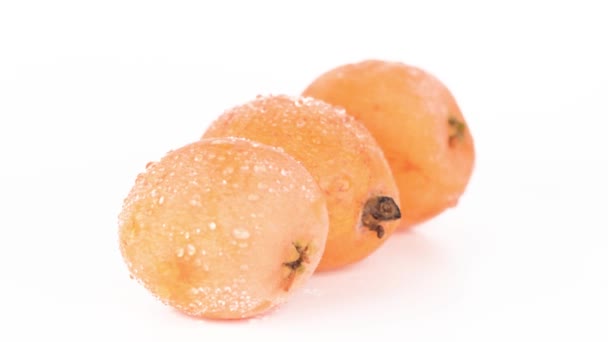 Three Fresh Orange Japanese Loquats Stack Isolated White Background — Stock Video